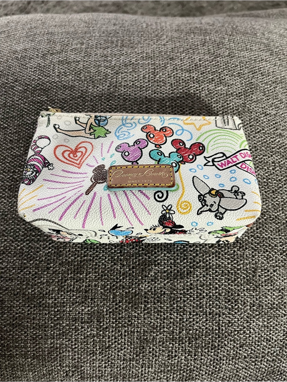 Like new Dooney & Bourke White Disney Sketch Print Zip Pouch